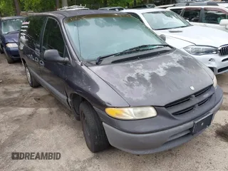 1996 Dodge Caravan Sport with VIN 2B4GP4439TR803645, listed as a IAAI auction lot 42122379 with 185,159 mi miles and . Bid and sale history available at carsss.com. Image 1.