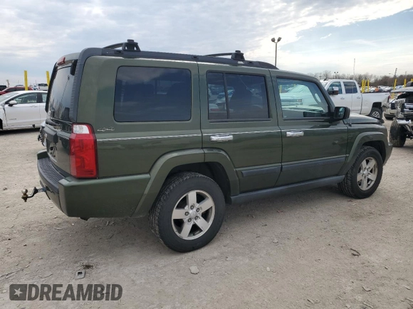 2006 Jeep Commander with VIN 1J8HG48K06C297654, listed as a Copart auction lot 51000155 with 126,235 mi miles and Salvage Title. Bid and sale history available at DreamBid. Image 3.