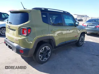 2015 Jeep Renegade Trailhawk with VIN ZACCJBCT6FPC11721, listed as a IAAI auction lot 41759053 with 95,499 mi miles and . Bid and sale history available at DreamBid. Image 4.