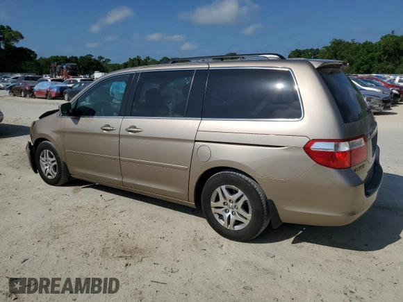 2007 Honda Odyssey EX-L z VIN 5FNRL38607B418045, wystawiony jako Copart lot #51469885 z przebiegiem 180 108 mil mil oraz Szkoda całkowita • Salvage title. Historia ofert i sprzedaży dostępna na DreamBid. Obrazek 2.