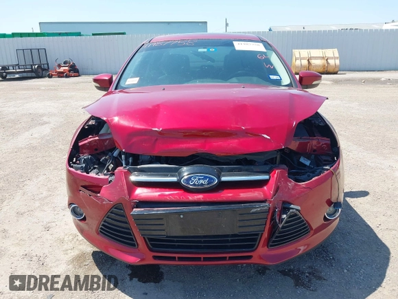 2013 Ford Focus Titanium with VIN 1FADP3J23DL334161, listed as a IAAI auction lot 41987758 with 117,665 mi miles and . Bid and sale history available at carsss.com. Image 12.