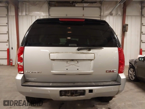 2013 GMC Yukon SLT with VIN 1GKS2CE06DR323343, listed as a IAAI auction lot 41643959 with 246,658 mi miles. Bid and sale history available at carsss.com. Image 17.