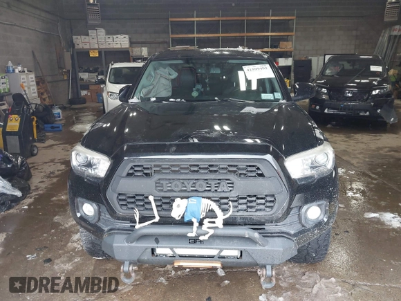 2016 Toyota Tacoma SR with VIN 3TMCZ5AN5GM037336, listed as a IAAI auction lot 41599492 with 76,262 mi miles. Bid and sale history available at carsss.com. Image 12.