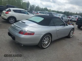 2000 Porsche 911 z VIN WP0CA2992YS654053, wystawiony jako Copart lot #56706365 z przebiegiem 153 481 mil mil oraz Czysty tytuł • Clean title. Historia ofert i sprzedaży dostępna na DreamBid. Obrazek 3.