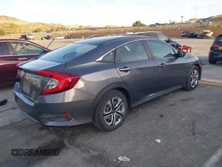 2016 Honda Civic Sedan LX with VIN 2HGFC2F55GH532108, listed as a IAAI auction lot 41860382 with 124,106 mi miles. Bid and sale history available at carsss.com. Image 4.