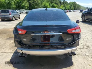 2018 Maserati Ghibli S Q4 z VIN ZAM57YTA0J1300472, wystawiony jako Copart lot #57342775 z przebiegiem 98 614 mil mil oraz Szkoda całkowita • Salvage title. Historia ofert i sprzedaży dostępna na DreamBid. Obrazek 6.