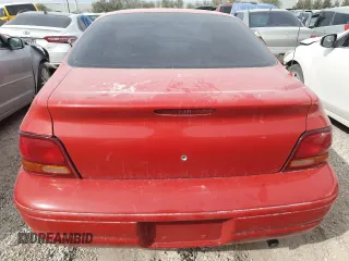 2000 Dodge Stratus z VIN 1B3EJ46X5YN246444, wystawiony jako Copart lot #84977054 z przebiegiem 159 505 mil mil oraz Nie do naprawy • Non repairable. Historia ofert i sprzedaży dostępna na DreamBid. Obrazek 6.