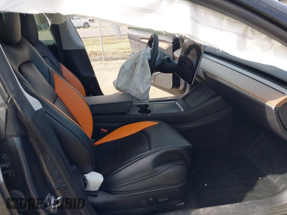 2022 Tesla Model 3 Long Range with VIN 5YJ3E1EB0NF314870, listed as a IAAI auction lot 41762301 with 38,840 mi miles and . Bid and sale history available at DreamBid. Image 5.