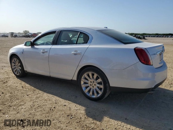 2012 Lincoln MKS with VIN 1LNHL9DR1CG806329, listed as a Copart auction lot 52293485 with 115,762 mi miles and Salvage Title. Bid and sale history available at carsss.com. Image 2.