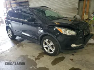 2016 Ford Escape SE with VIN 1FMCU9GX1GUC24692, listed as a Copart auction lot 88102815 with 114,900 mi miles and Salvage Title. Bid and sale history available at DreamBid. Image 4.