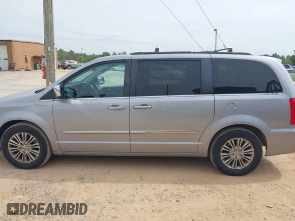 2014 Chrysler Town & Country Touring L with VIN 2C4RC1CG9ER376058, listed as a IAAI auction lot 42099348 with 186,226 mi miles and . Bid and sale history available at DreamBid. Image 14.