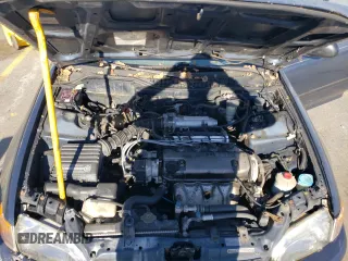 1995 Honda Civic DX z VIN 1HGEG8545SL057793, wystawiony jako Copart lot #83930844 z przebiegiem 209 745 mil mil oraz Czysty tytuł • Clean title. Historia ofert i sprzedaży dostępna na DreamBid. Obrazek 11.
