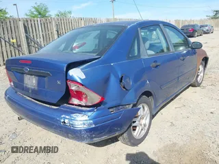 2002 Ford Focus SE with VIN 1FAFP34302W129809, listed as a IAAI auction lot 42083220 with 217,739 mi miles and . Bid and sale history available at carsss.com. Image 4.