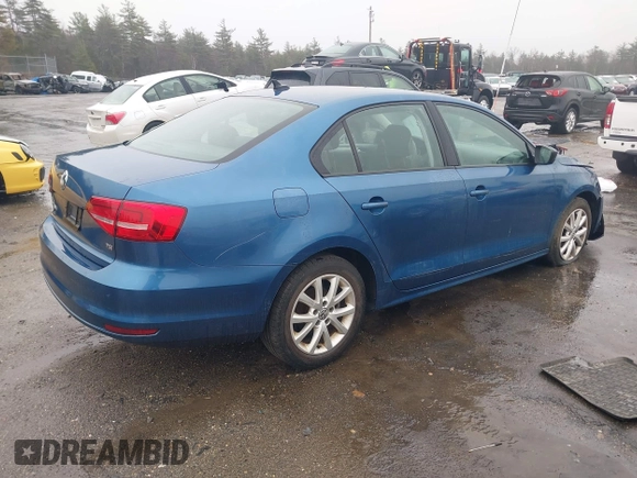2015 Volkswagen Jetta Sedan 1.8T SE with VIN 3VWD17AJ7FM233634, listed as a IAAI auction lot 41942329 with 128,996 mi miles. Bid and sale history available at carsss.com. Image 4.