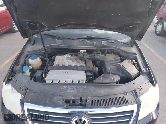 2006 Volkswagen CC Sport with VIN WVWEU73C36E090796, listed as a IAAI auction lot 41876976 with 195,309 mi miles and . Bid and sale history available at DreamBid. Image 10.