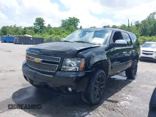 2013 Chevrolet Tahoe LT with VIN 1GNSCBE00DR337071, listed as a IAAI auction lot 42282457 with 151,460 mi miles and . Bid and sale history available at DreamBid. Image 2.