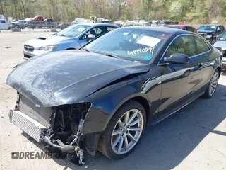 2016 Audi A5 Premium Plus z VIN WAUM2AFR5GA011293, wystawiony jako IAAI lot #41990091 z przebiegiem 131 353 mil mil oraz . Historia ofert i sprzedaży dostępna na DreamBid. Obrazek 2.