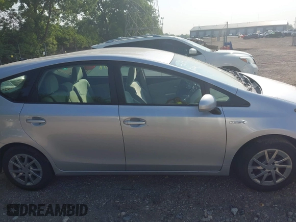 2012 Toyota Prius Two z VIN JTDZN3EU3C3042560, wystawiony jako IAAI lot #42409918 z przebiegiem 182 875 mil mil oraz . Historia ofert i sprzedaży dostępna na DreamBid. Obrazek 13.