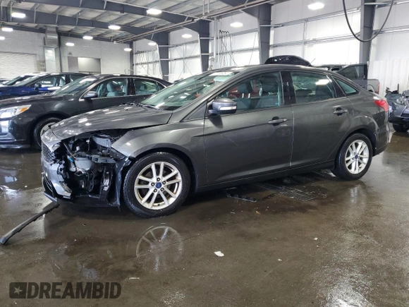 2017 Ford Focus SE with VIN 1FADP3F21HL205754, listed as a Copart auction lot 67166984 with 83,617 mi miles and Salvage title. Bid and sale history available at DreamBid. Image 1.