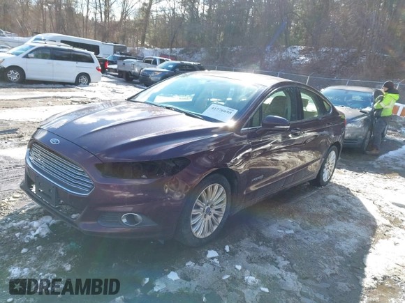 2013 Ford Fusion SE Hybrid z VIN 3FA6P0LU1DR251738, wystawiony jako IAAI lot #41576698 z przebiegiem 158 735 mil mil oraz . Historia ofert i sprzedaży dostępna na DreamBid. Obrazek 2.