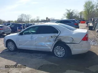 2012 Ford Fusion Hybrid с VIN 3FADP0L31CR325835, выставлен на аукционе IAAI как лот 41982489 с пробегом 124 266 миль миль и . История ставок и продаж доступна на DreamBid. Изображение 14.