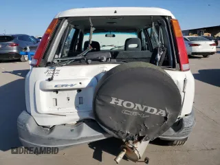 1999 Honda CR-V EX with VIN JHLRD1865XC079929, listed as a Copart auction lot 50104755 with 203,209 mi miles and Salvage Title. Bid and sale history available at carsss.com. Image 6.