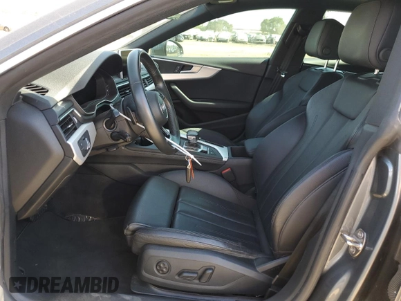2018 Audi A5 Sportback Premium with VIN WAUDNCF51JA130255, listed as a Copart auction lot 69116454 with 58,292 mi miles and Salvage Title. Bid and sale history available at carsss.com. Image 7.