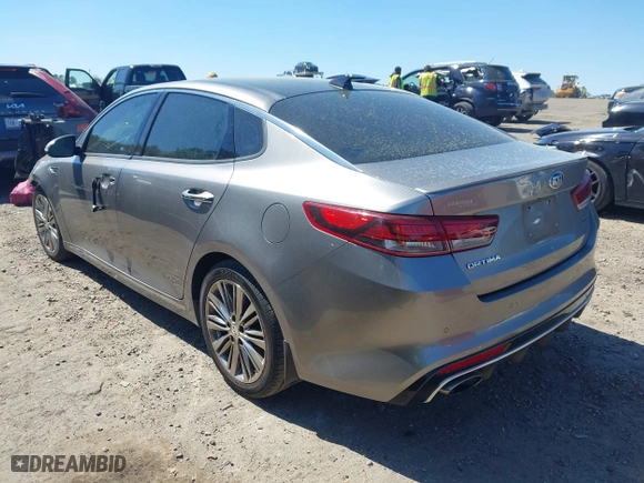 2018 Kia Optima SX with VIN 5XXGV4L26JG187281, listed as a IAAI auction lot 41887939 with 124,782 mi miles. Bid and sale history available at carsss.com. Image 3.