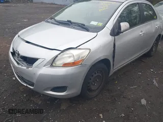2009 Toyota Yaris with VIN JTDBT903494047486, listed as a IAAI auction lot 42173242 with 145,225 mi miles. Bid and sale history available at carsss.com. Image 6.