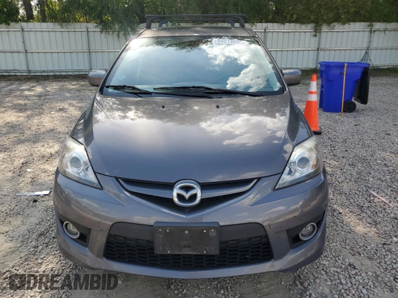 2010 Mazda 5 Sport z VIN JM1CR2W34A0386374, wystawiony jako Copart lot #54013095 z przebiegiem 76 871 mil mil oraz Szkoda całkowita • Salvage title. Historia ofert i sprzedaży dostępna na DreamBid. Obrazek 5.