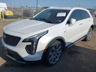 2022 Cadillac XT4 FWD Premium Luxury с VIN 1GYFZCR48NF138181, выставлен на аукционе IAAI как лот 42187527 с пробегом Не указан миль и . История ставок и продаж доступна на DreamBid. Изображение 2.