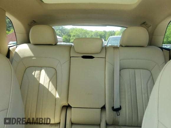 2018 Audi Q5 Premium with VIN WA1ANAFY2J2027998, listed as a Copart auction lot 59474155 with 96,309 mi miles and Salvage title. Bid and sale history available at DreamBid. Image 10.