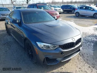 2015 BMW M4 with VIN WBS3R9C57FK334921, listed as a IAAI auction lot 41869773 with 107,058 mi miles. Bid and sale history available at carsss.com. Image 6.