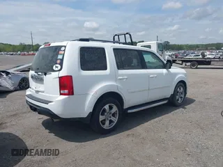 2014 Honda Pilot EX-L with VIN 5FNYF3H50EB005811, listed as a IAAI auction lot 42115804 with 216,033 mi miles and . Bid and sale history available at DreamBid. Image 4.