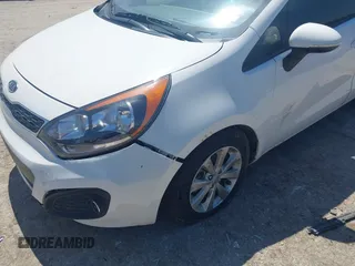 2013 Kia Rio SX with VIN KNADN5A30D6097807, listed as a IAAI auction lot 41958802 with 23,944 mi miles. Bid and sale history available at carsss.com. Image 6.