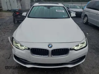 2017 BMW 3 Series 330i xDrive z VIN WBA8D9G36HNU66250, wystawiony jako Copart lot #60902585 z przebiegiem 104 030 mil mil oraz Szkoda całkowita • Salvage title. Historia ofert i sprzedaży dostępna na DreamBid. Obrazek 5.