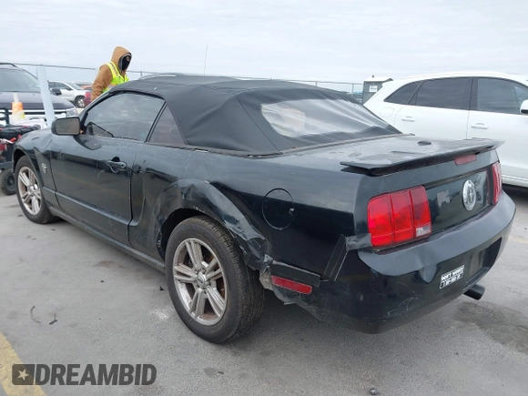 2009 Ford Mustang with VIN 1ZVHT84N995137661, listed as a IAAI auction lot 41380685 with 185,620 mi miles and . Bid and sale history available at DreamBid. Image 3.