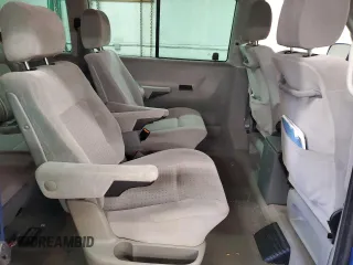 2003 Volkswagen EuroVan с VIN WV2KB47053H044308, выставлен на аукционе Copart как лот 81267494 с пробегом 174 679 миль миль и Чистый • Clean title. История ставок и продаж доступна на DreamBid. Изображение 11.