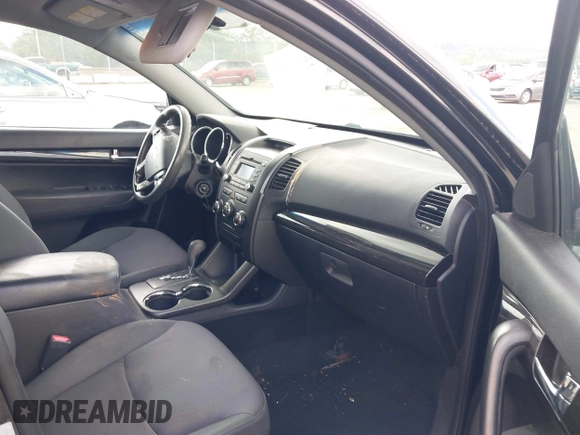 2013 Kia Sorento LX with VIN 5XYKTDA68DG408823, listed as a IAAI auction lot 42554361 with 221,917 mi miles and . Bid and sale history available at DreamBid. Image 5.