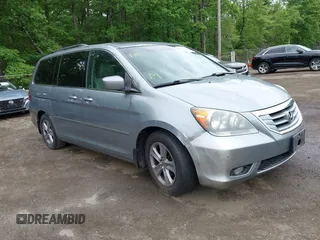 2008 Honda Odyssey Touring with VIN 5FNRL38908B066127, listed as a IAAI auction lot 42219444 with 188,868 mi miles and . Bid and sale history available at DreamBid. Image 1.