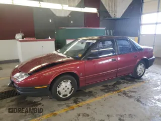 1995 Saturn SL z VIN 1G8ZH5284SZ188708, wystawiony jako Copart lot #85942884 z przebiegiem 151 918 mil mil oraz Szkoda całkowita • Salvage title. Historia ofert i sprzedaży dostępna na DreamBid. Obrazek 1.