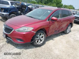 2013 Mazda CX-9 Touring with VIN JM3TB2CA7D0406488, listed as a IAAI auction lot 42377362 with 172,740 mi miles and . Bid and sale history available at DreamBid. Image 2.