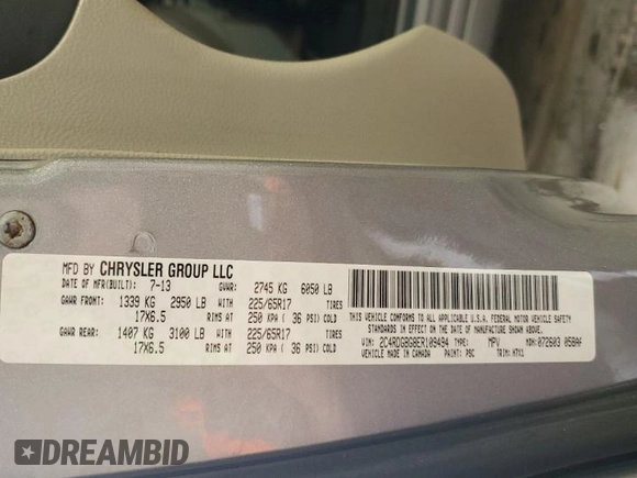 2014 Dodge Grand Caravan American Value with VIN 2C4RDGBG8ER109494, listed as a Copart auction lot 49459085 with 151,832 mi miles and Salvage Title. Bid and sale history available at DreamBid. Image 13.
