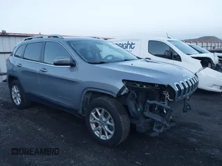 2014 Jeep Cherokee Latitude with VIN 1C4PJMCSXEW220556, listed as a IAAI auction lot 41060501 with 70,152 mi miles and . Bid and sale history available at carsss.com. Image 1.