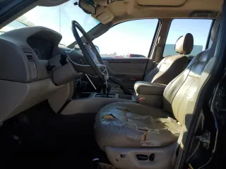 2002 Jeep Grand Cherokee Limited z VIN 1J8GW58SX2C286904, wystawiony jako Copart lot #84749214 z przebiegiem Nie podano mil oraz Czysty tytuł • Clean title. Historia ofert i sprzedaży dostępna na DreamBid. Obrazek 7.