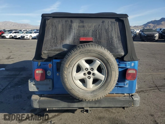 2003 Jeep Wrangler X z VIN 1J4FA39S33P320254, wystawiony jako Copart lot #52392525 z przebiegiem 206 325 mil mil oraz Szkoda całkowita • Salvage title. Historia ofert i sprzedaży dostępna na DreamBid. Obrazek 6.