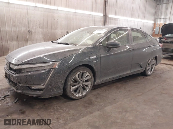2018 Honda Clarity Touring z VIN JHMZC5F39JC002521, wystawiony jako IAAI lot #41428968 z przebiegiem 64 014 mil mil oraz . Historia ofert i sprzedaży dostępna na DreamBid. Obrazek 18.