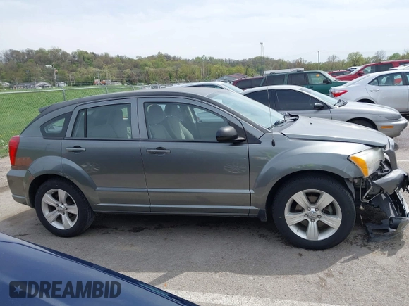 2012 Dodge Caliber SXT with VIN 1C3CDWDA6CD506019, listed as a IAAI auction lot 41999560 with 146,446 mi miles and . Bid and sale history available at DreamBid. Image 14.