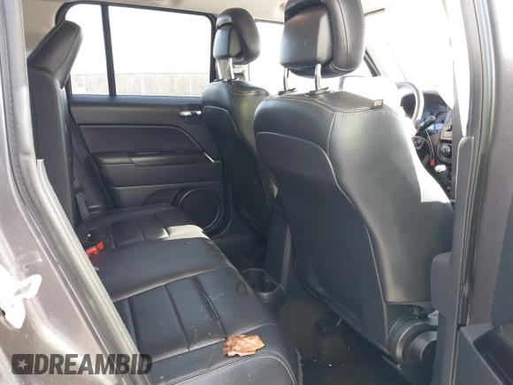 2015 Jeep Patriot Latitude with VIN 1C4NJRFB0FD245169, listed as a IAAI auction lot 41612404 with 68,065 mi miles and . Bid and sale history available at DreamBid. Image 8.
