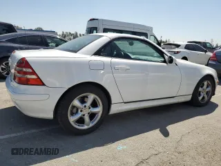 2001 Mercedes-Benz SLK-Class with VIN WDBKK65F81F210099, listed as a Copart auction lot 52606105 with 129,849 mi miles and Salvage Title. Bid and sale history available at carsss.com. Image 3.
